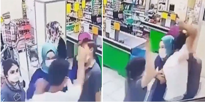 Market �al��an� kad�nla m��terinin kavgas� kamerada