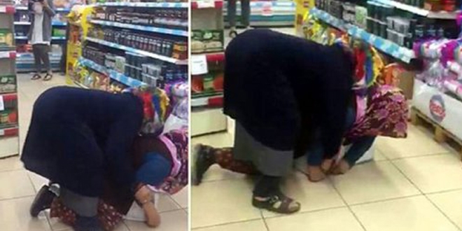 Marketin ortasında düdüklü tencere kavgası