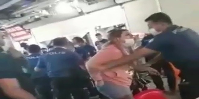 Maske cezası yazmak isteyen polise yumruk atan evli çift gözaltına alındı