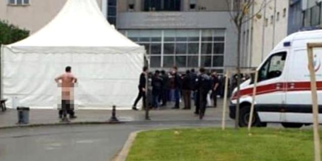 'Kovid-19 sırasını protesto için soyundu' iddiası yalanlandı