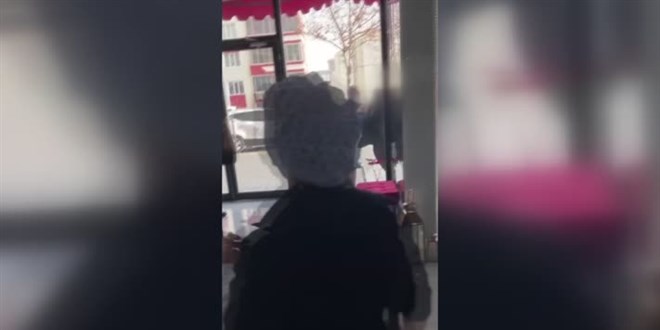 Maske takmadığı için polise zorluk çıkartan kadın, esnafla tartıştı