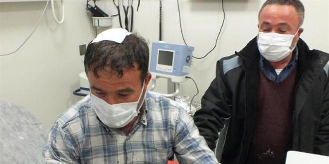 Ceviz b�y�kl���nde doludan arac�n� korumak istedi, hastanelik oldu