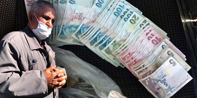 Dilencinin �zerinden 2 bin 200 lira ve 100 euro ��kt�