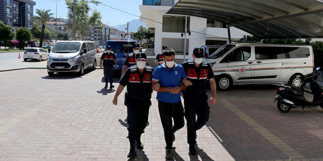 'Kayıp' dediği eşini öldürüp iş makinesiyle araziye gömen koca tutuklandı