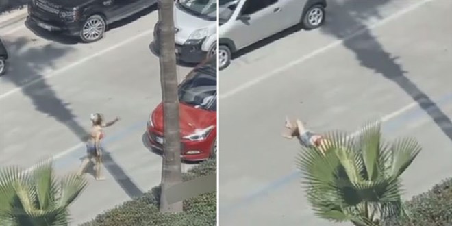 Yolun ortasına yatan kadın, tepki gösteren sürücülere saldırdı