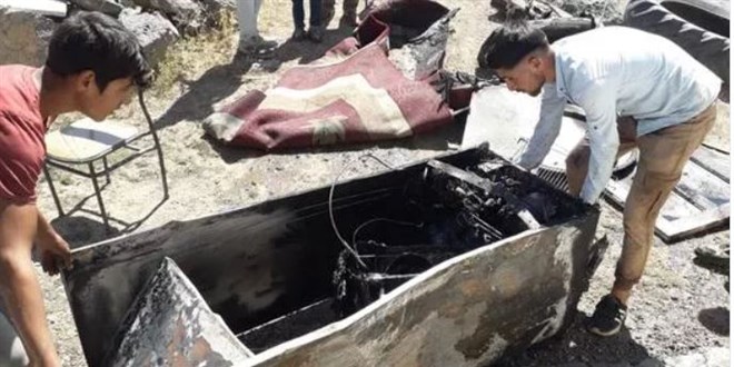 Buzdolabı bomba gibi patladı, çocuklarını pencereden atarak kurtardı