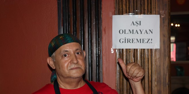 İşletmeci iş yerine 'Aşı olmayan giremez' yazısı astı