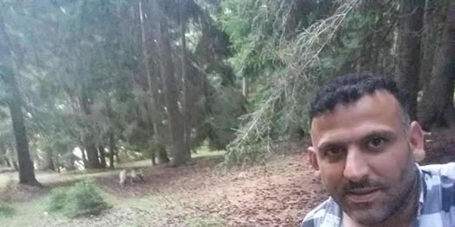 Ormanda karşılaştığı ayı ile selfie yaptı