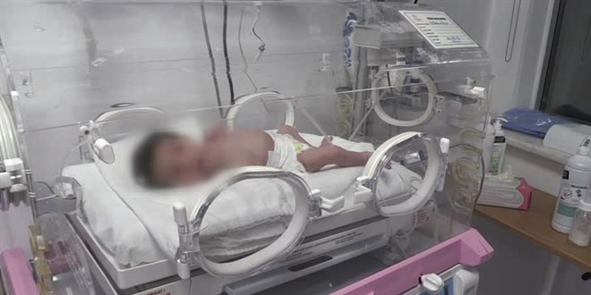 Mezarlıkta toprağa yarı gömülü bulunan bebek koruma altına alındı