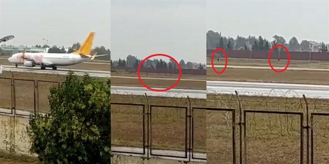 Adana Havalimanı'nda bir grup, piste inen uçağın önüne çıktı
